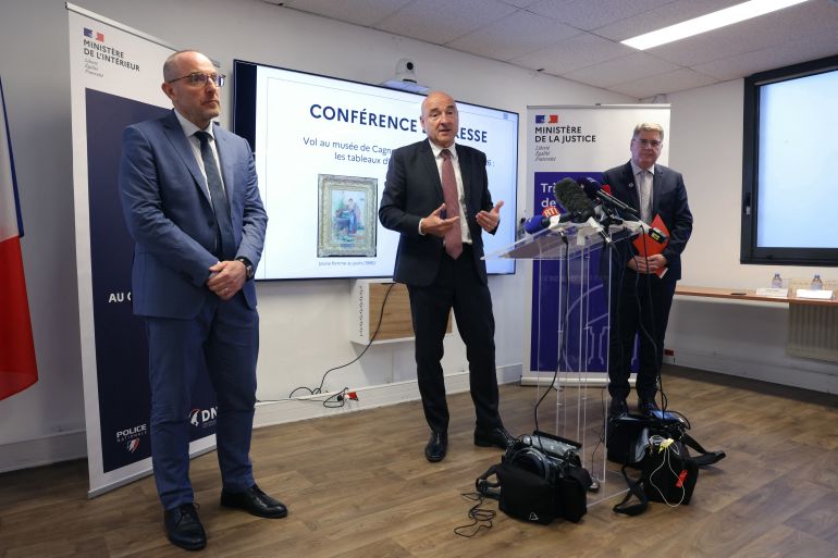 Stolen Renoir paintings found behind wall in France following arrests