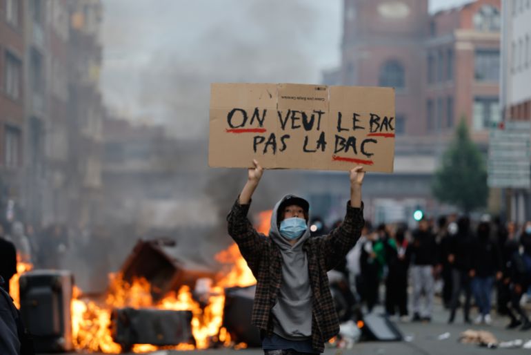 School protests spread as fires, blockades deepen unrest in France